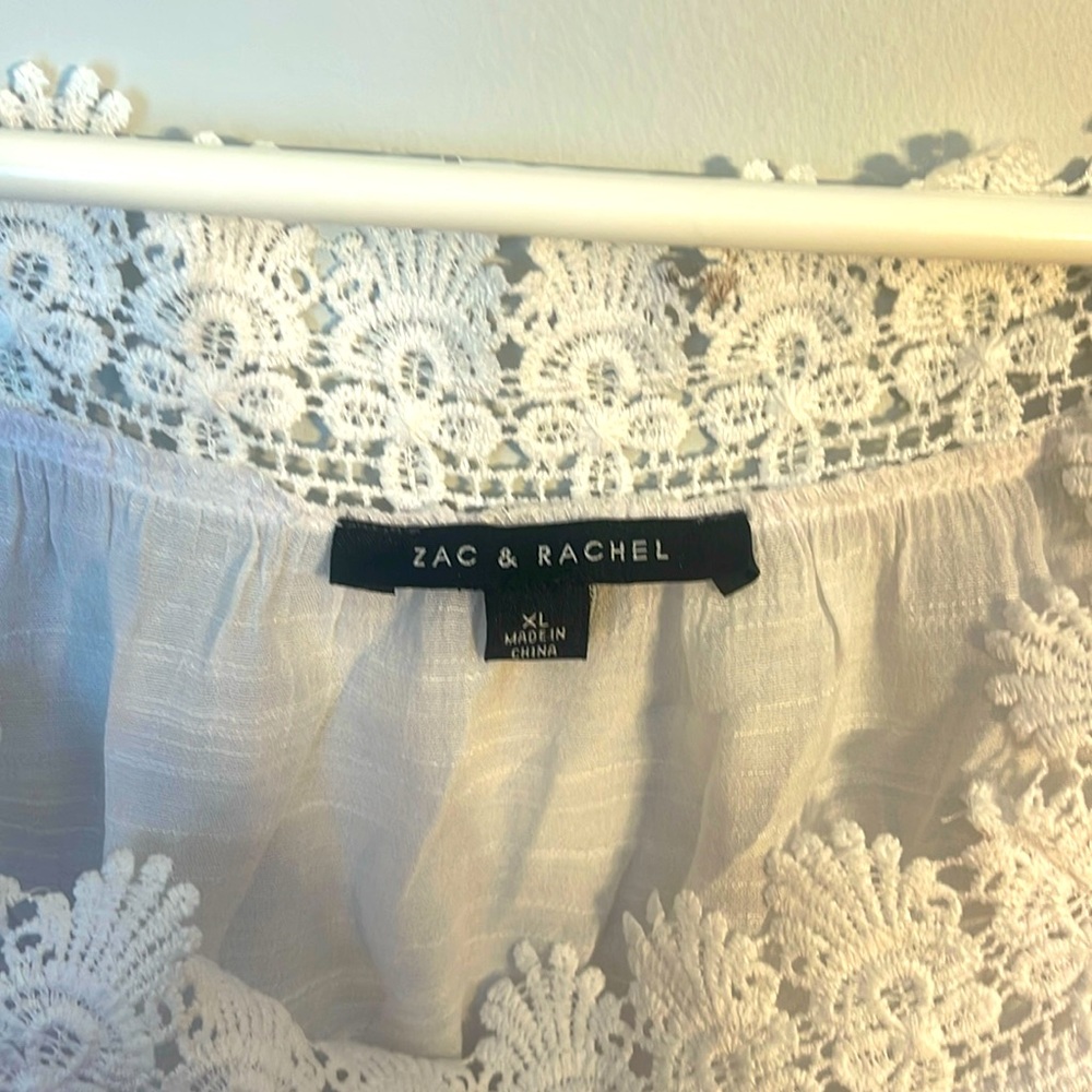 White top xl brand is Zack and Rachel